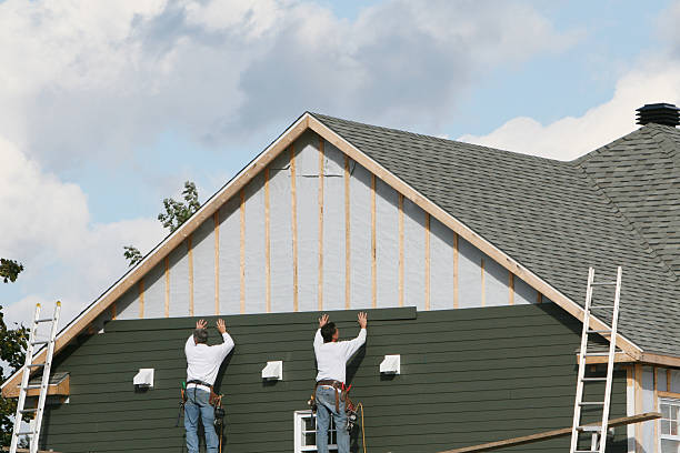 Professional Emergency Siding Repair technician working in Eldorado, OH